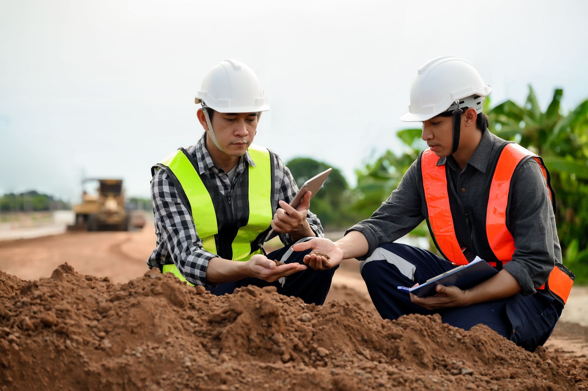 Engineer inspecting soil sample at construction site Gold Coast