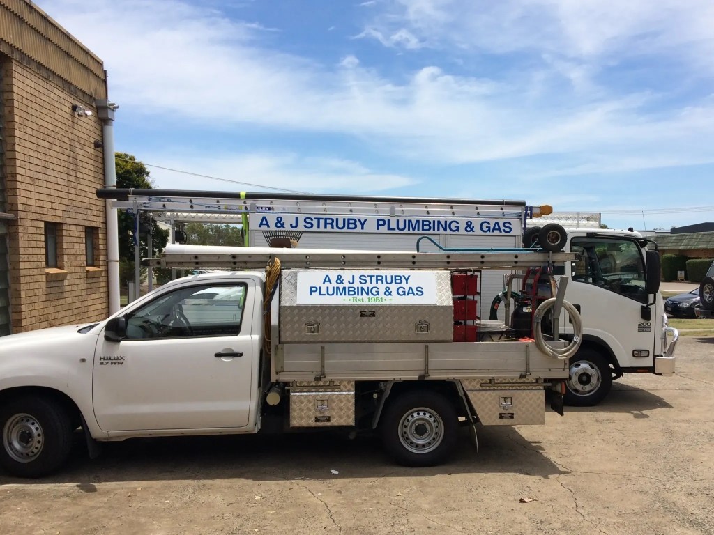 A & J Struby Plumbing & Gas ute and truck parked outside the Mount Gravatt East workshop