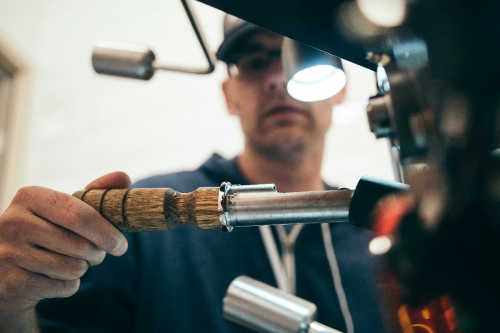 Tradesman working with tools in a workshop